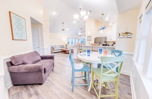 Hatteras Condo | SUMMER SAVINGS - Canalfront Condo w/Private Deck, Resort Pool, and Boat Slips