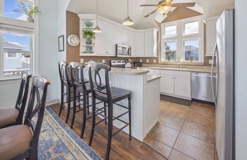Wind Over Waves House | SUMMER SAVINGS Semi-Soundfront Dog Friendly w Pool, Hot Tub, Elevator, Cmty Dock