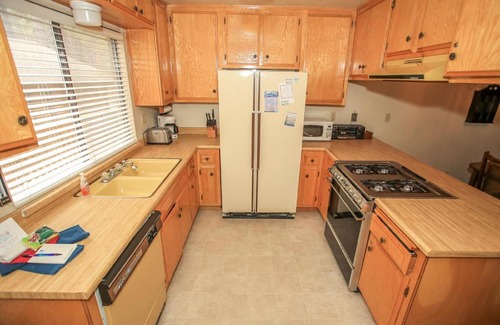 Summit Estates House | Summit Getaway Condo - Affordable and ideally located, Wood burning fireplace! Walk to Ski Resort