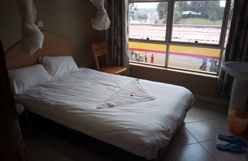 Kabati House | Summit Guest House & Grill