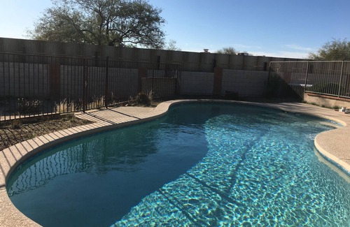 Tres Lomas North House | Sun-kissed foothills home with stunning mountain views and heated pool.