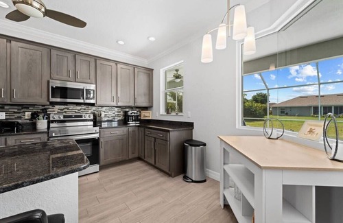 Long Meadow House | Sun-Soaked & Tranquil Getaway Relaxing Pool Area