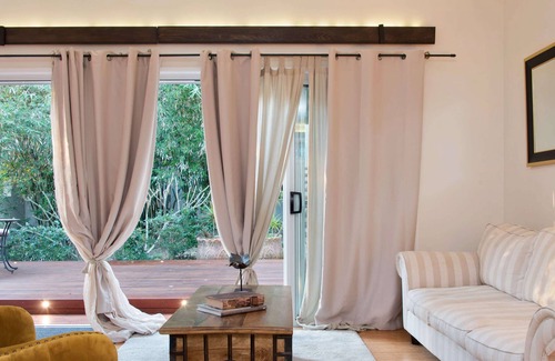 Sunrise Beach House | Sunbathe on the Deck at a Bali-Style Sunrise Beach Getaway