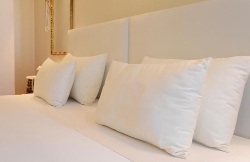 Sandim House | Sundial Gardens & Suites