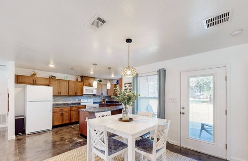 Northeast Pensacola House | Sunny and updated home with workspace, beach gear, games, and firepit