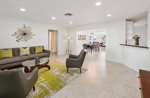 Garden Isles House | Sunny Canal, Modern waterfront 3 bedroom pool home