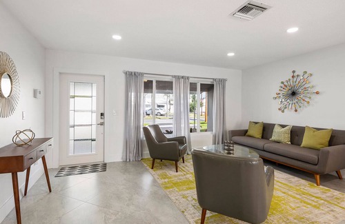 Garden Isles House | Sunny Canal, Modern waterfront 3 bedroom pool home