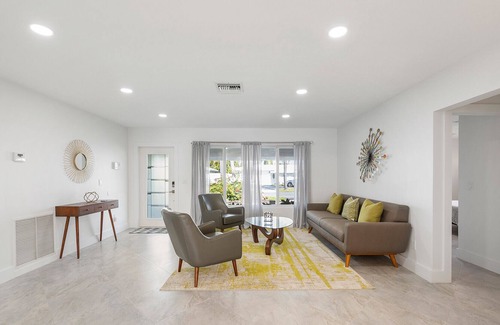 Garden Isles House | Sunny Canal, Modern waterfront 3 bedroom pool home