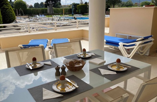 Cala Bona Apartment | Sunny Gardenia Apt- Pool-nr Beach-2 bedroom-2 bathroom-AC-Wifi-Private Sunbeds