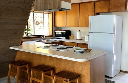Hayden Lake Cabin | Sunny Lakefront A-Frame cabin, Private dock, sunset views & pet friendly!