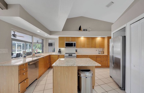 Palm Harbor House | Sunny Sanctuary W Salt Water Pool & Game Room! 10 minutes to beach