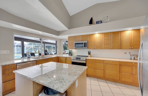 Palm Harbor House | Sunny Sanctuary W Salt Water Pool & Game Room! 10 minutes to beach