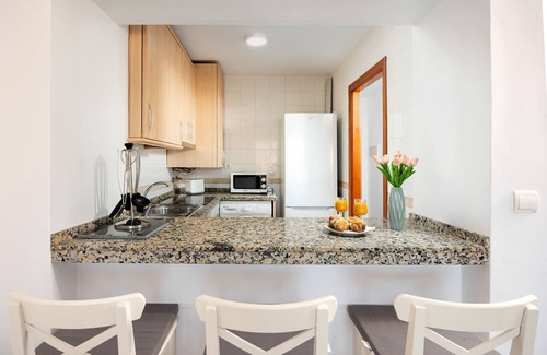 El Faro Apartment | Sunny Terrace Getaway by Alfresco Stays