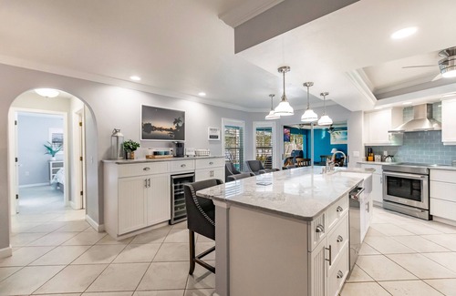 Caloosahatchee House | Sunny Waterfront Oasis: Your Dream Pool Home with Southern Exposure