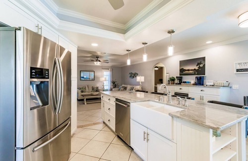 Caloosahatchee House | Sunny Waterfront Oasis: Your Dream Pool Home with Southern Exposure