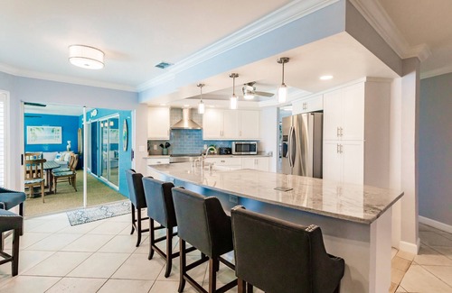 Caloosahatchee House | Sunny Waterfront Oasis: Your Dream Pool Home with Southern Exposure