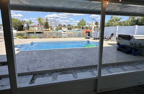 Sea Ranch On The Gulf House | Sunny Waterfront Oasis! Private Pool, Hot Tub & Dock!