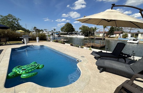 Sea Ranch On The Gulf House | Sunny Waterfront Oasis! Private Pool, Hot Tub & Dock!
