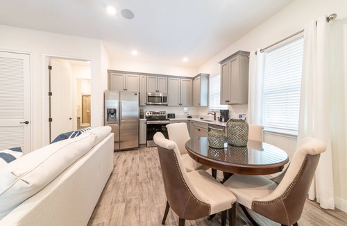 West Kissimmee Cottage | Sunny Yellow Cottage near Disney with Margaritaville Resort & Island H2O Access.