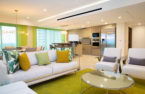 Punta Sam Condo | Sunrise Secrets: Discover Unforgettable Mornings in your 3BR PH in Cancun!