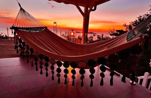 Malendure Villa | Sunset Bay - Luxueuse villa et sa magnifique vue les Ilets Pigeon