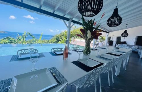 Malendure Villa | Sunset Bay - Luxueuse villa et sa magnifique vue les Ilets Pigeon
