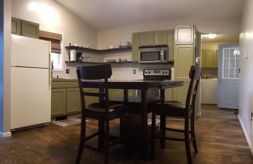 Six Lakes Cottage | Sunset Cottage: Lakefront Escape - Fenced Yard - Pet Friendly - Kayaks - Fishing