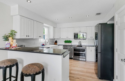 Indian Rocks Beach Condo | Sunset Hideaway - Private Dock, 3 Balconies, Stock Tank/Plunge Pool