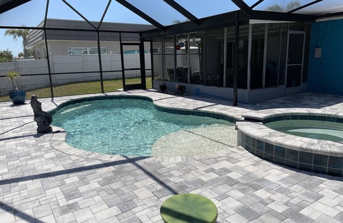 Gulf Harbors House | Sunset Serenity Retreat: Coastal Elegance with Poolside Bliss