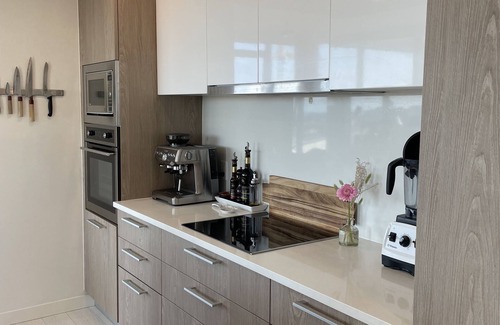 Mount Pleasant Condo | Sunset view 2 bed, 2 bath condo in heart of Mount Pleasant w/gym + deck