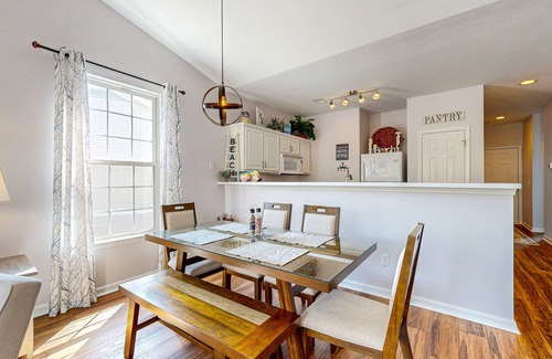 Sunset Beach Condo | Sunset Village top-floor end unit with golf & pond views, pools & hot tub
