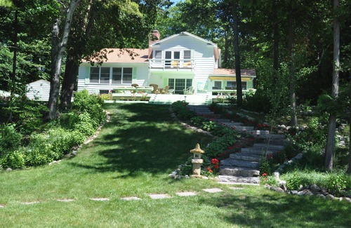 Clam River House | Sunsets,140' on Torch Lk,Lg Dock,Hot Tub,Tennis/Pickle Crt,Kayaks,Play/swing set