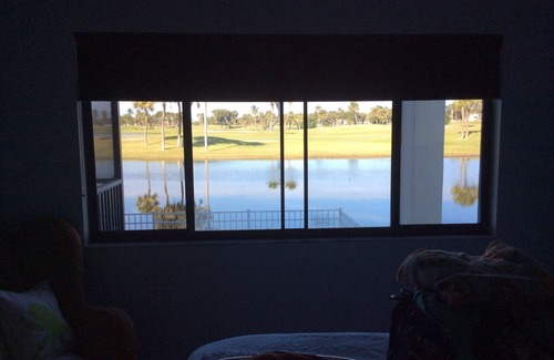 Stuart Condo | Sunshine & Palm Trees Overlooking The Water- Walk To The Beach!