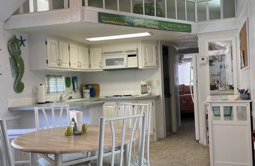 Fort McCoy Cottage | Super roomy Park Model in premier resort with lake, pools, dock and boat launch.