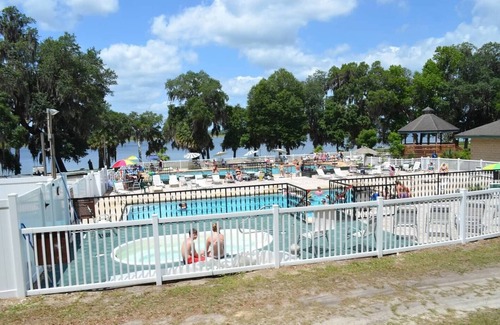 Fort McCoy Cottage | Super roomy Park Model in premier resort with lake, pools, dock and boat launch.