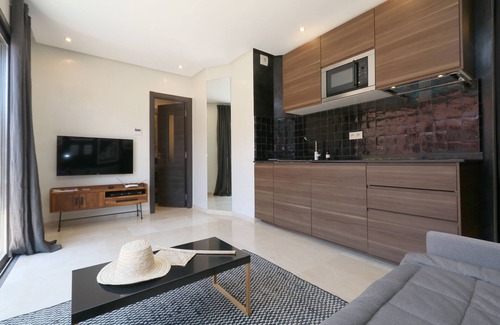 El Hara Apartment | SUPERB STUDIO WITH PRIVATE TERRACE AND POOL ACCESS