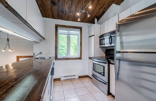Stoneham Condo | Superbe Condo Face aux Pentes de ski Stoneham!
