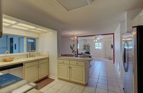 Cocoa Isles House | Surfer's Corner - Cozy Waterfront Oasis w/Fire Pit - Walk to Beach
