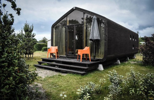 Ouddorp Ski Chalet | Sustainable cottage made of recycled cardboard