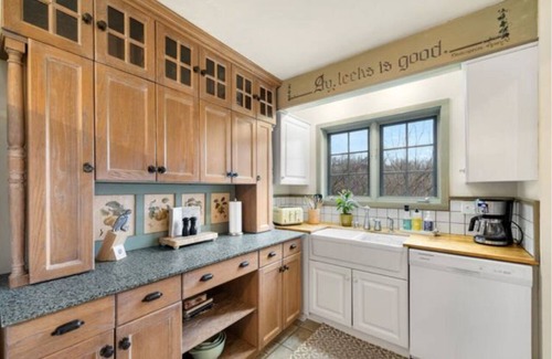 La Crosse House | Swedish Storybook in bluffs hiking trails & stream