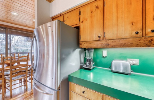 Plymouth House | Sweet chalet with private hot tub, firepit, game room & minibar