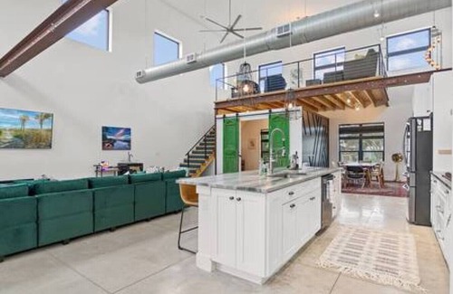 Butler Beach House | Swim & Dock in Style: Art Deco Beach Escape