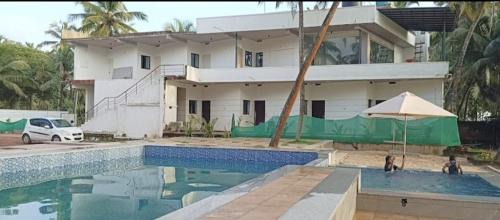 Malpe House | Swimming pool beach front Homestay Malpe udupi
