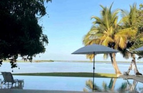 Ayapel Villa | T R A V E S I A S, VIBRA HERMOSA