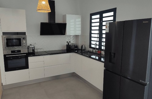 Centre-Ville Apartment | T4 duplex and rooftop in the heart of Saint-Pierre, this new luxury residence be