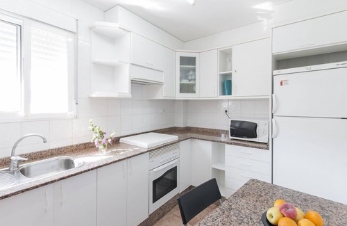 Grao de Gandia House | TALLAROL - Sunny apartment with furnished balcony on the second line to the beach.