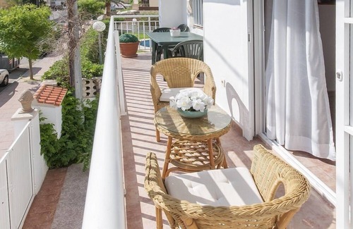 Grao de Gandia House | TALLAROL - Sunny apartment with furnished balcony on the second line to the beach.
