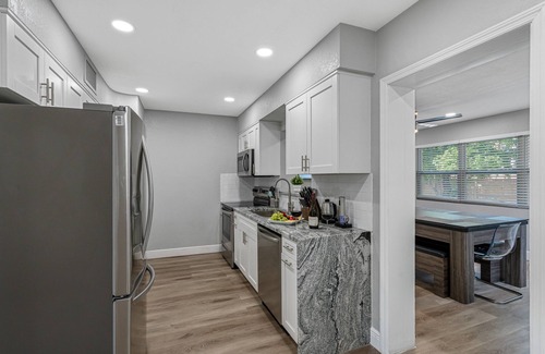 Bearss Plaza House | Tampa Oasis: Dive Into Luxury with Our Heated Pool House!
