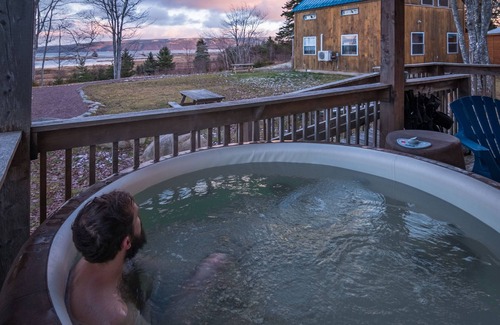 Indian Brook Ski Chalet | Tan Chalet at Cabot Shores Wilderness Resort