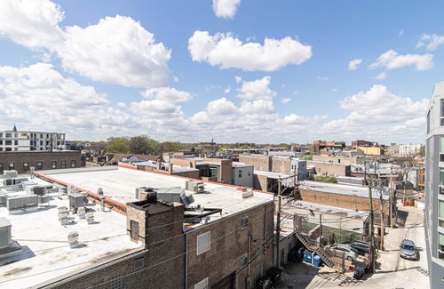 Logan Square Apartment | Tasteful Logan Square 2BR w/Gym, Roof Deck, 1 block to L, by Blueground